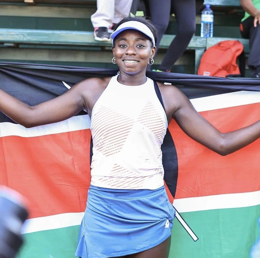 Angella Okutoyi celebrates with the Kenyan flag