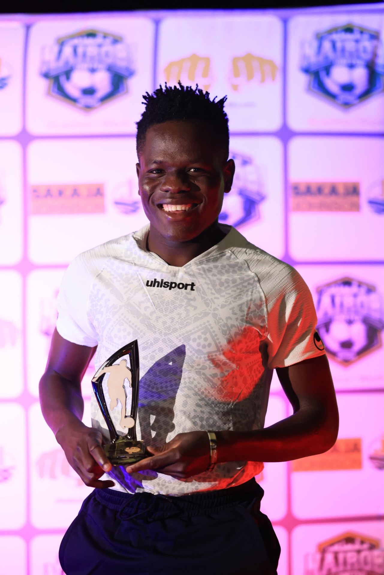 Dancan Omala with his award